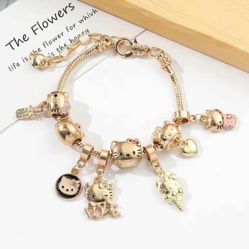 SOLD- Hello Kitty Charm Bracelet Fashion Jewelry Gold Tone